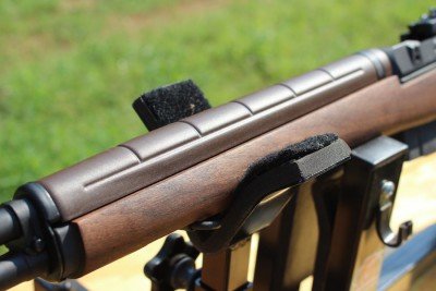 The handguard is plastic and clips onto the barrel.