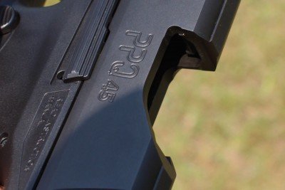 The ejection port is wide enough to throw the empty cases free.