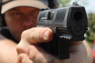 The PPQ M2 in .45 is wide. As far as concealed carry pistols go, I'd prefer to carry it with a jacket.