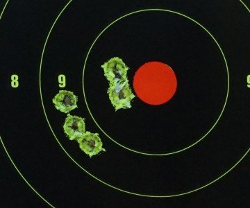 Accuracy with the iron sights isn't bad, though they were meant for speed of acquisition and not precision.