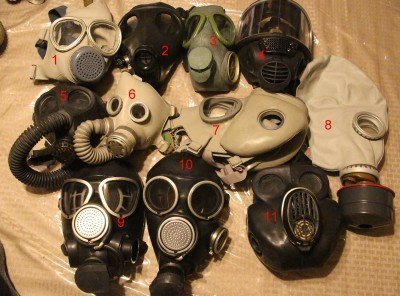 You absolutely do not need to spend big bucks on a gas mask like #4 in this picture, which is one of my Scott masks I purchased just after 911.  They are #1- a $16 Vietnamese cheek pouch mask that only has one filter, (not mentioned in the article). #2 - Adult Israeli mask. #3- Serbian mask with 60mm thread filters. #5 - Children's PDF-2 (size 2). #6 - Children's PDF-D (size 1). #7 - Czeck M-17 copy. #8 - Russian GP-5 with Swiss filter on it. #9 Russian newer GP-7 type. #10 - Older GP-7 type. #11 Russian PBF "Gorilla" mask in black.