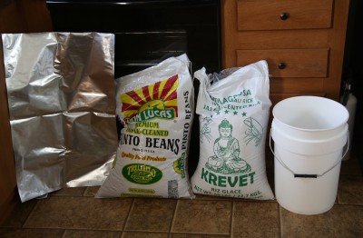 I found that while my 6 gallon buckets hold 40 lbs of rice or beans, a 50 lb. bag of either fits easily. 
