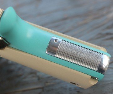 The silver shine is like jewelry against the ivory and blue.