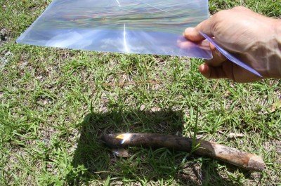 The large magnifier could light anything even slightly dark colored. The military firestarters didn't even get warm though. This stick burst into flames in like 5 seconds in the direct Florida sun. 