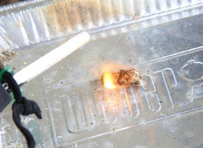 The little piece of fluffy rope turns into a burning blob of plastic pretty quick, and it stays burning for a couple minutes. 