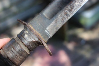 Someone attacked this blade with a file in an effort to sharpen it, and they didn't file off a new secondary edge. Instead, they ran it up the original grind lines. 