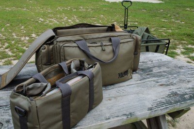 The author arrives at the range like a vacationing pack rat. The bag is from Midway USA, and is a great value.