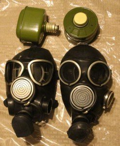 Since my original foray into buying gas masks I have been a fan of the slightly more expensive Russian civilian GP-7 mask.  You can get them on Ebay right now for like $30 with a canteen and carry bag.  On the left is the updated version, which apparently is the PMK military mask. I don't see much of a difference, but most of the PMKs on Ebay don't have that port on the left for another filter. All of the GP-7 masks come with an inner frame that keeps the shape of the mask rigid. That is what you see through the lens in the picture. 