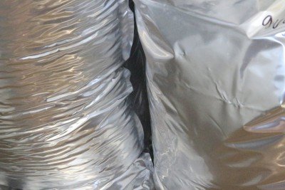 Sometimes you'll find that the absorbers suck in the bag, sometimes not. It depends on the contents.  2000ccs is way more than how much O2 is in a 20,000 cc bag with stuff in it. O2 is only 21% of the atmosphere. 