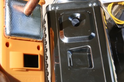 The charging/fan unit comes off the stove, and you can see the way it works. That copper rod is connected to the TEG pad, which is sealed onto the back of the plastic assembly. 