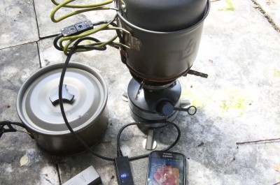 Initially I was disappointed with the PowerPot because using water in the pot as a heatsink needs a lot of BTUs, and the Rocket Stove doesn't have a lot of BTUs. But then I realized that for most people in cities, a gasoline stove is probably your best option for cooking. This is the 5 watt running at about 3/5ths with this single burner gasoline stove. 