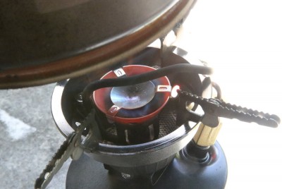 A gasoline stove generates a ton of BTUs. The phone instantly started charging, with the same pot full of water which is a very efficient heatsink. 