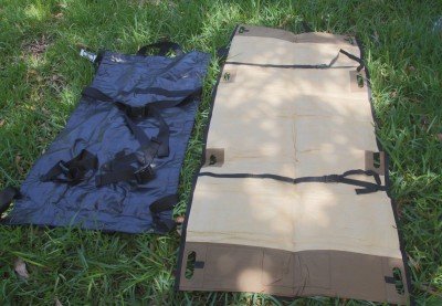 On the right is the Blackhawk litter. On the right is the litter with the "wee wee pad" absorbent top. The Blackhawk litter has tie down straps so you can drag the patient alone. 