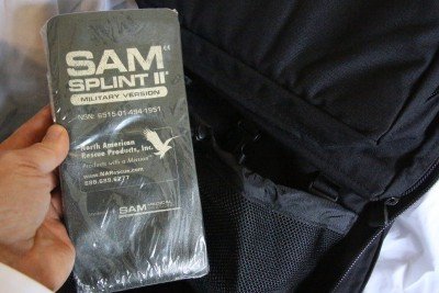 The Military kits usually have one of these SAM Splints. They are just pieces of high density foam. If you have plenty of duct tape and zip ties, you can make a splint out of anything stout. Just be careful with cutting off circulation with zip ties. 