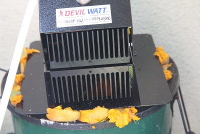 This may seem silly, but I try to solve problems with things I can find on the ground when I am working on survival stuff. I wanted to seal off the bottom plate of the 15 watt open flame Devil Watt so I used these fruits that fell from one of my trees. I don't know if you can eat them, but they make a great seal to get the power rocking along. 