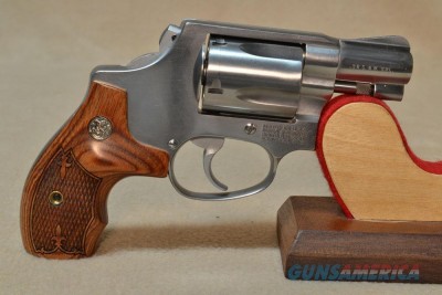 Smith & Wesson Model 60 revolver, caliber .38 special, with a 2 inch barrel. This is a model 60-7, early 1990s production. The Model 60 is a stainless double action revolver with a 5 shot cylinder for sale on GunsAmerica. 