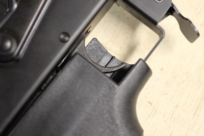 As you push forward, the trigger comes into contact with your trigger finger.