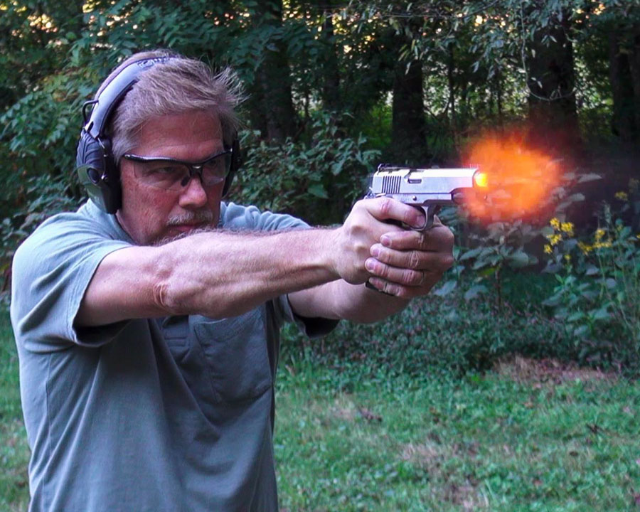 The author takes the very first shot through the custom 1911 he just built.