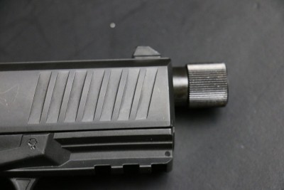 The rimfire with the thread protector in place. 