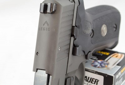 The Legion logo is engraved on the top of the slide just forward of the rear sight.