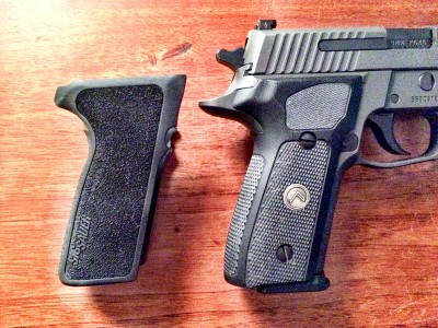 The new G10 grips are ever so slightly larger around than the standard one-piece P229 grips.