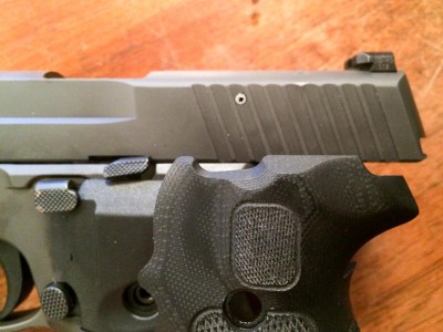 I was a little worried that the new controls might not allow fitting of a Crimson Trace Lasergrip as they do not have the same cutout as the G10 grips, but the Lasergrips worked fine.