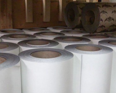 A Visit to Talon Grips It all starts with large rolls of granulate or rubber material.