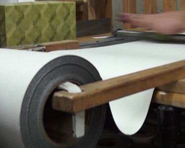 A Visit to Talon Grips Material from the raw rolls is cut into machine-sized panels for the laser cutters.