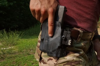 The holster holds onto the mount more than the gun. 