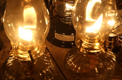 Even when you trim the wicks perfectly square, most tend to lean to one side, which creates a smoke trail at full blast. You can turn them down and minimize this. 