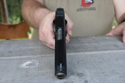 No need to choke it. Too much pressure sends shots off target and can damage triggers.