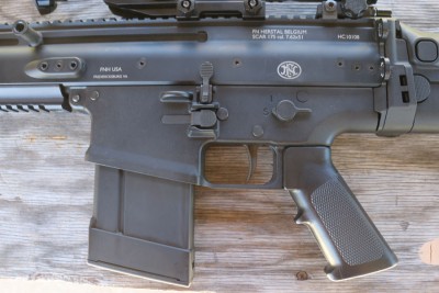 The SCAR uses a propriatary magazine. There are aftermarket options, like this plastic version, available. 