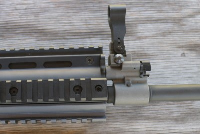 The hooded front sight is built into the gas block.