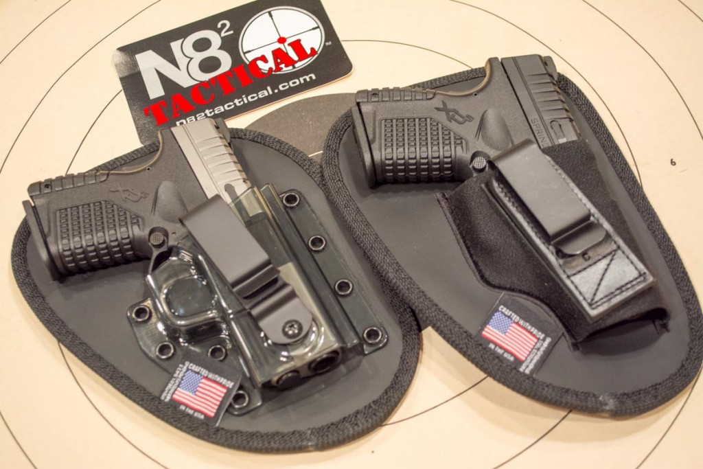 The N82 Tactical Professional (left) and Tuckable (right) holding a pair of Springfield Armory XD-S pistols.