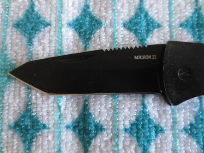 A shot of the tanto-style blade.  Note the jimping on the spine to improve grip.  
