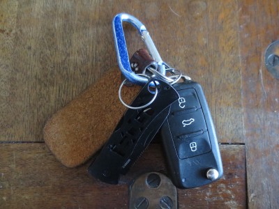 The SOG Micron II on my keychain.  It's heavy enough to notice, but not too heavy where it becomes a pain.  