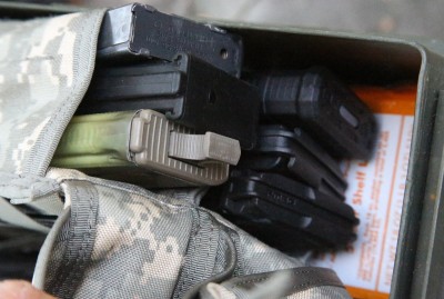It probably is smarter to leave your ammo out of your mags to conserve the springs, but I put it in to conserve space. 