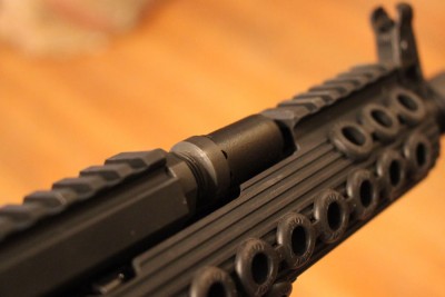 Troy Takes on the AK-47 That section is lower than the section on the gas tube.