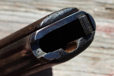 This one has the magazine catch on the bottom one clue that this is a 1st series pistol. 