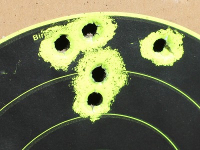 5 rounds from 50 yards, not bad for iron sights and an antiquated rifle.