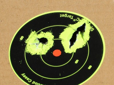 The Henry Original--New Old Gun Review Five through two holes. The curse of the random flier--or was it poor trigger discipline?