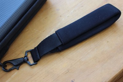 The wrist strap. It is nicely padded, and quite secure. It would help protect you from a snatch-and-run scenario. 