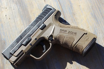 The extended mag on the new XD Sub Compact highlights just how short the barrel is.