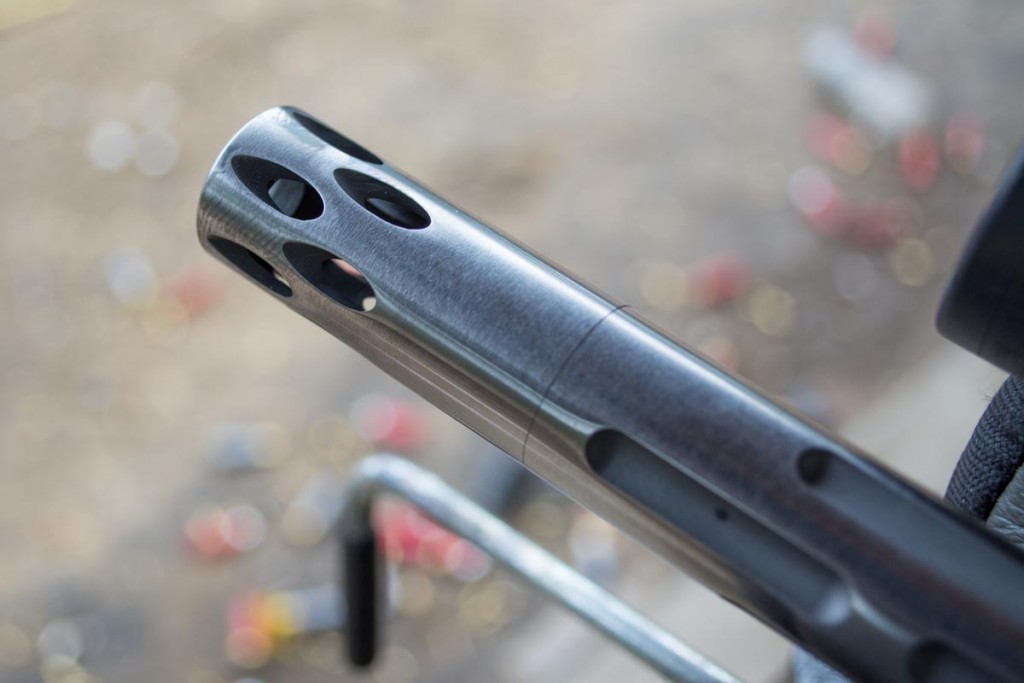 The muzzle device on the Volquartsen fluted barrel.