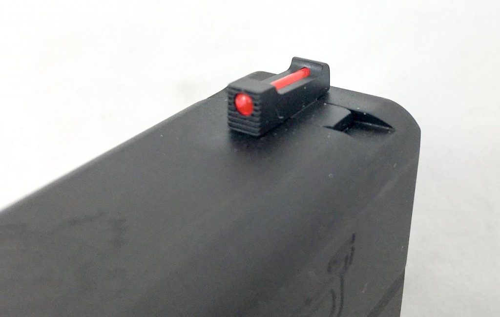 The front fiber optic sight is red, but you can easily change it out in a few minutes with a knife and lighter.
