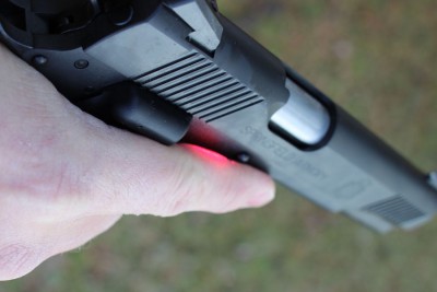 I tend to block the laser with my trigger finger when keeping it off the trigger. Training would cure this if I was going to use this as an EDC. 