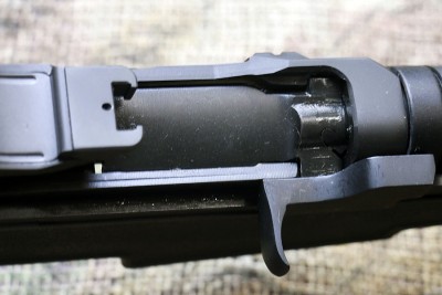 The charging handle is on the right side, which may mean you will need to do the old reach-around if you want to keep your right hand on the grip.