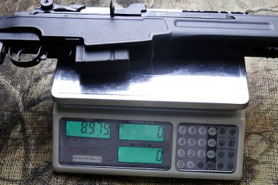 The gun comes in at 8.975 pounds.