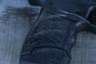 New texturing with enhanced finger grooves combined with the seven round extended magazine makes this gun feel like a baby PPQ.