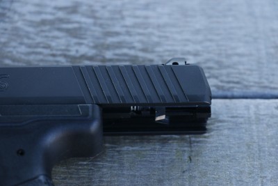 The rear cocking serrations have been changed for a more traditional look.